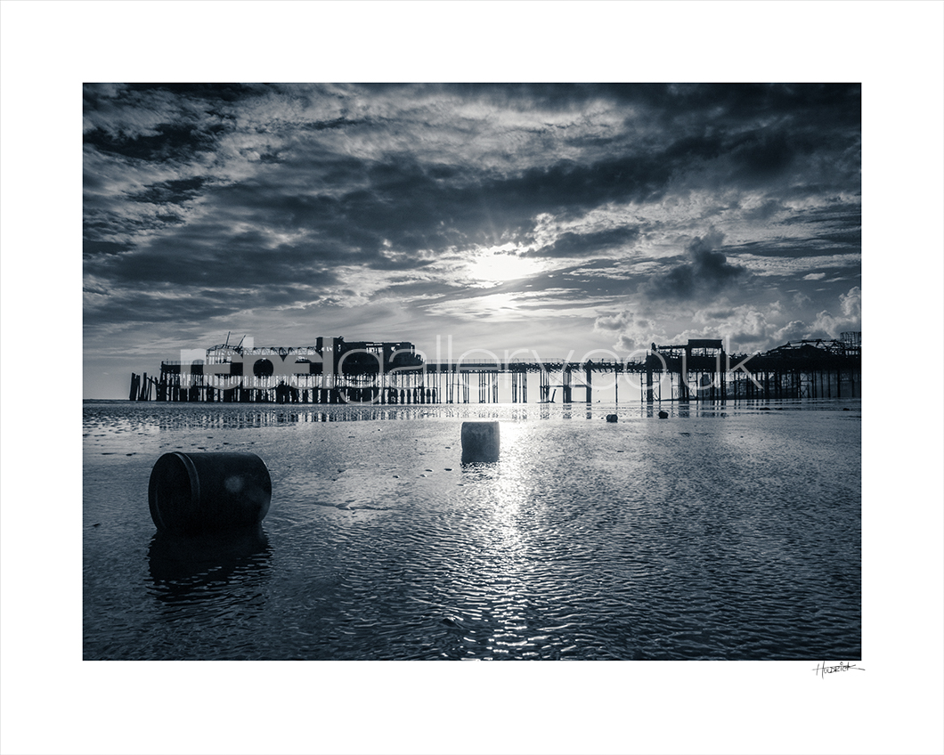 Photograph of Hastings Pier after the fire in 2010 by Hastings Photographer Jon "Huldrick' Wilhelm.